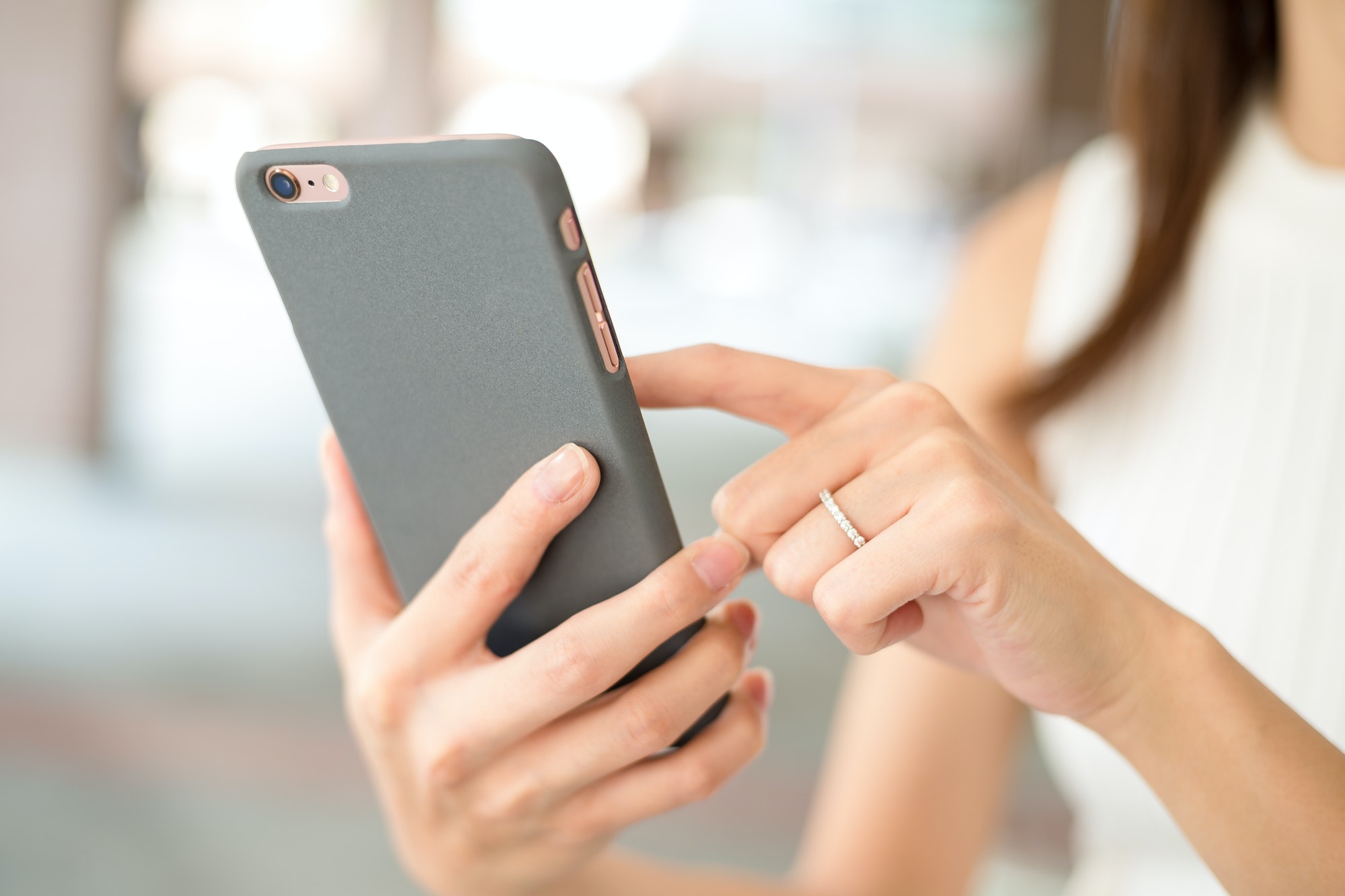 Woman texting on phone